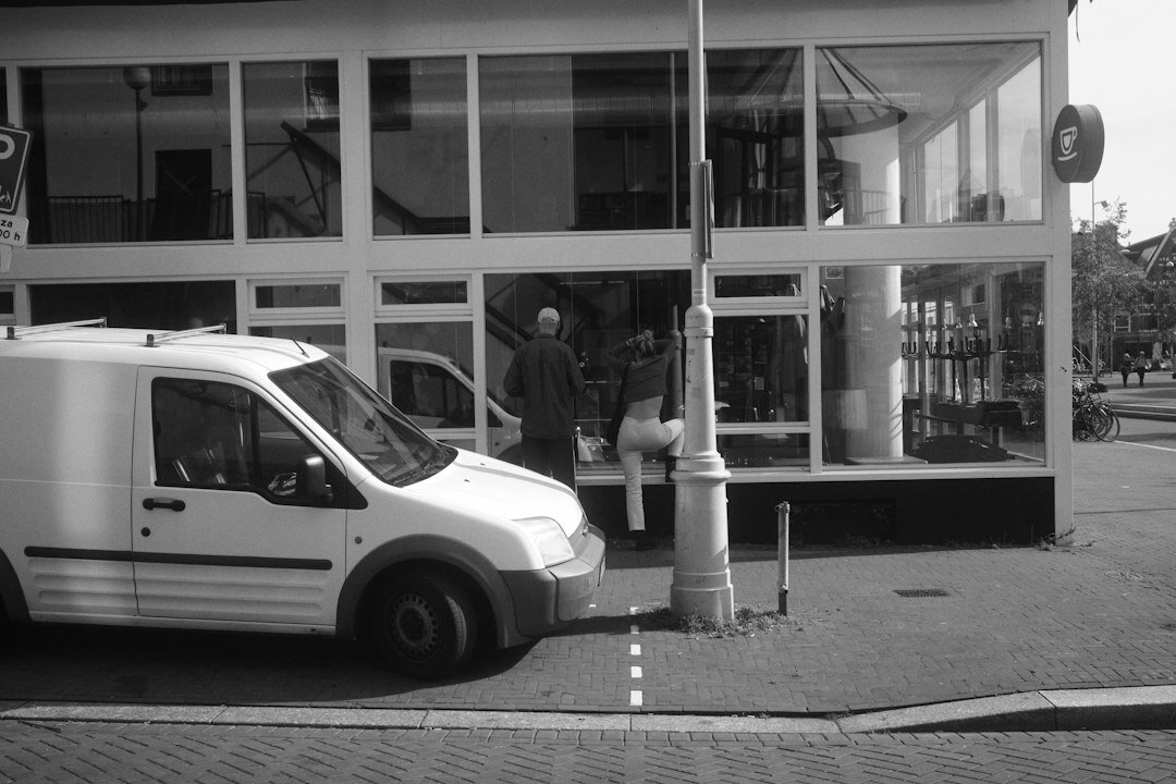 Outside broadcast van with cables and camera operator during a live event